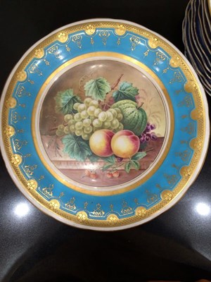 Lot 68 - A Minton Porcelain Tazza, circa 1870, painted with a still life of fruit on a marble shelf within a