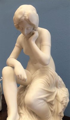 Lot 71 - A Copeland Parian Figure of a Classical Maiden, circa 1870, loosely draped sitting on a rocky...