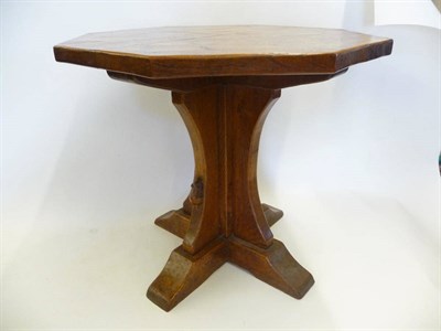 Lot 1808 - A Robert "Mouseman" Thompson Oak Octagonal Table, with quarter section top, on a cruciform...