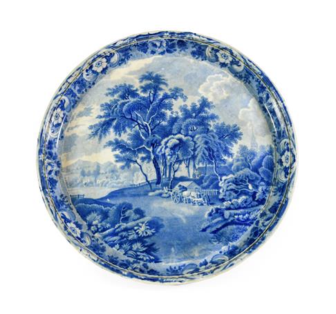 Lot 81 - A Pearlware Cheese Stand, circa 1820, of circular form, printed in underglaze blue with a...