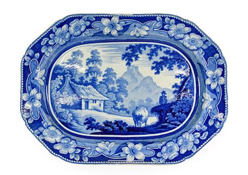 Lot 84 - A Staffordshire Pearlware Platter, circa 1820, printed in underglaze blue with the Cowman...