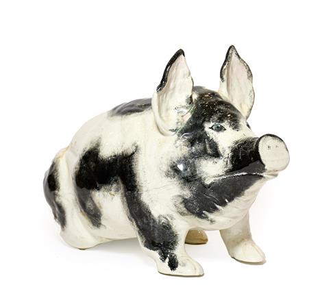 Lot 92 - A Wemyss Pottery Pig, early 20th century, naturalistically modelled seated, with black sponged...