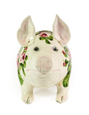 Lot 94 - A Wemyss Pottery Pig, early 20th century, naturalistically modelled seated, painted with pink...