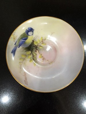 Lot 98 - A Royal Worcester Porcelain Miniature Cup and Saucer, by Harry Stinton, 11915, painted with...