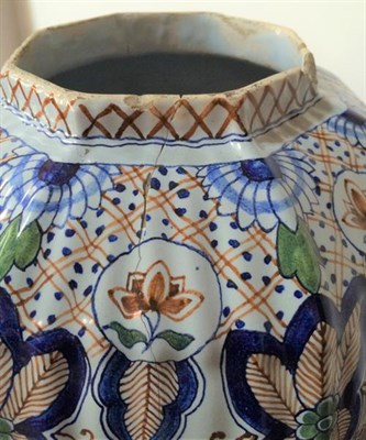 Lot 104 - A Delft Jar and Cover, in early 18th century style, of fluted octagonal baluster form, painted...