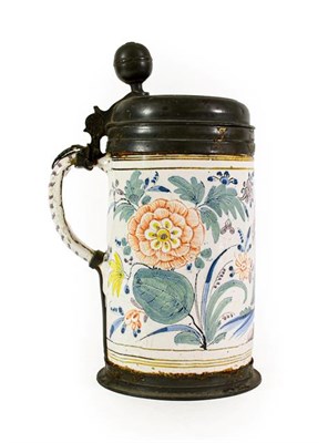 Lot 106 - A German Pewter Mounted Faience Tankard, dated 1760, of cylindrical form, painted in pale...
