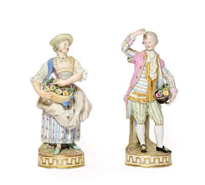 Lot 115 - A Pair of Meissen Porcelain Figures of Flower Sellers, late 19th century, both in 18th century...