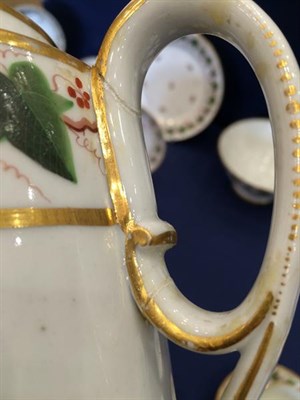 Lot 124 - A Paris Porcelain Tea and Coffee Service, early 19th century, painted with scattered ivy sprigs...