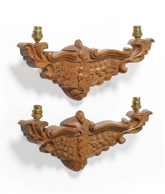 Lot 1814 - A Pair of Robert "Mouseman" Thompson Carved Oak Double Wall Light Brackets, with scrolling arms and