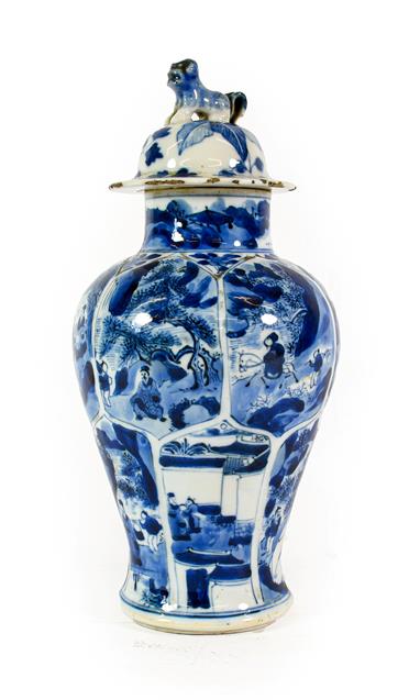 Lot 138 - A Chinese Porcelain Vase, Kangxi, of lappet moulded baluster form, painted in underglaze blue...