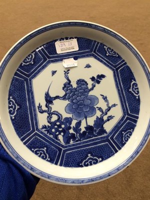 Lot 139 - A Chinese Porcelain Dish, Kangxi, of circular form, painted in underglaze blue with a bird...