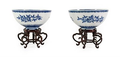 Lot 145 - A Pair of Chinese Porcelain Bowls, possibly Qianlong, painted in underglaze blue with fruit and...