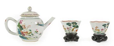 Lot 146 - A Chinese Porcelain Teapot and Cover, Qianlong, painted in famille rose enamels with pagodas in...