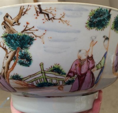 Lot 148 - A Chinese Porcelain Punch Bowl, Qianlong, painted in famille rose enamels with figures in...