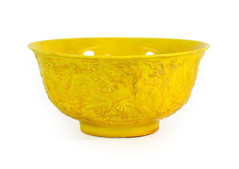 Lot 165 - A Chinese Yellow Glazed Porcelain Bowl, Hongzhi reign mark but not of the period, moulded with...