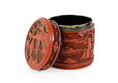Lot 174 - A Chinese Cinnabar Lacquer Box and Cover, Qing Dynasty, of cylindrical form, carved with figures in