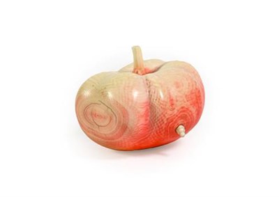 Lot 199 - A Japanese Ivory Fruit Okimono, Meiji/Taisho period, naturalistically carved and a stained as a...