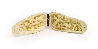Lot 200 - A Japanese Ivory Okimono, Meiji/Taisho period, naturalistically carved and stained as a mussel with