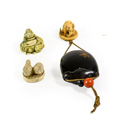 Lot 210 - A Japanese Lacquer Inro, Meiji period, in the form of a fruit, decorated with a leaf, 7.5cm, with a