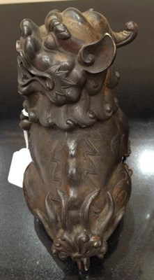 Lot 213 - A Japanese Bronze Koro and Cover, Meiji period, in the form of a crouching lion dog with...