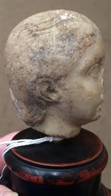 Lot 220 - A Carved Marble Head, possibly Roman, 1st century AD, 8cm high, on a later turned and stained...