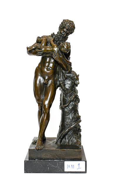 Lot 221 - After the Antique: A Bronze Figure of Silenus, standing beside a tree trunk holding Bacchus as...