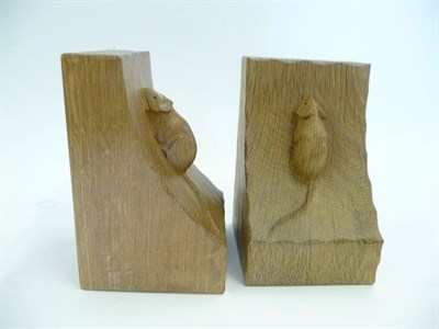 Lot 1823 - A Pair of Robert "Mouseman" Thompson Oak Bookends, each with single carved mouse, 15cm