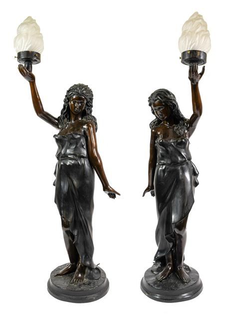 Lot 229 - A Pair of French Bronze Figural Torcheres, early 20th century, as classical maidens standing...