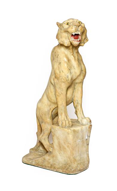 Lot 239 - Italian School (early 20th century): A Carved Alabaster Figure of a Seated Lioness, with glass eyes
