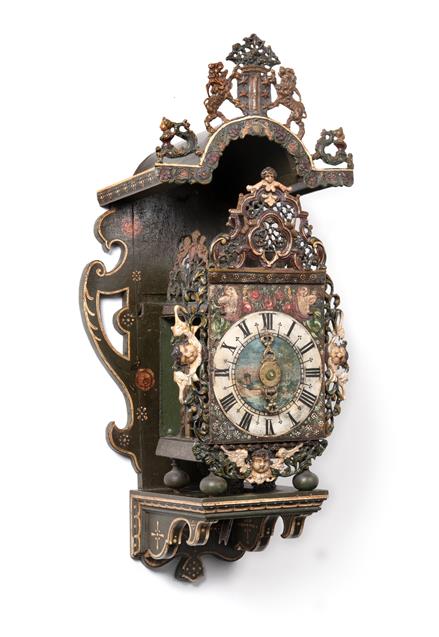 Lot 284 - A Polychrome Painted Dutch Stoelklok Striking Wall Clock, late 18th century, the elaborate case...