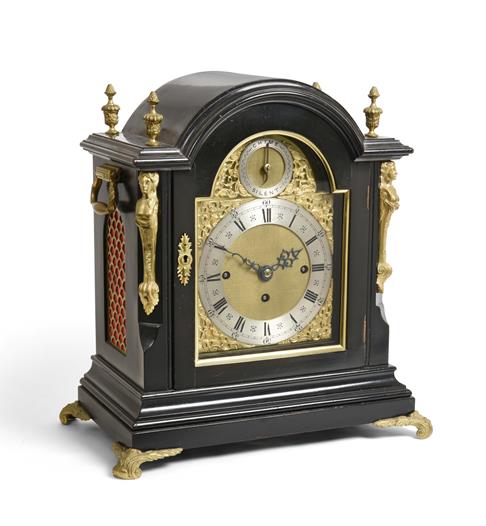 Lot 285 - A Victorian Ebonised Chiming Table Clock, circa 1880, arched pediment with urn shaped finials, fish
