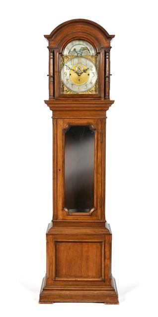 Lot 288 - An Oak Tubular Bell Chiming Longcase Clock, early 20th century, arched pediment, bevelled glass...