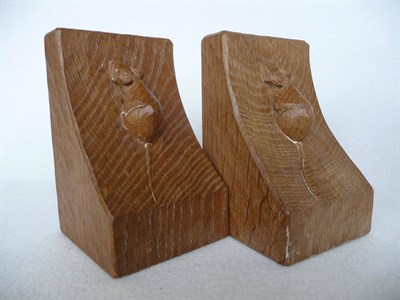 Lot 1830 - A Pair of Robert "Mouseman" Thompson Oak Bookends, each with single carved mouse, 15cm