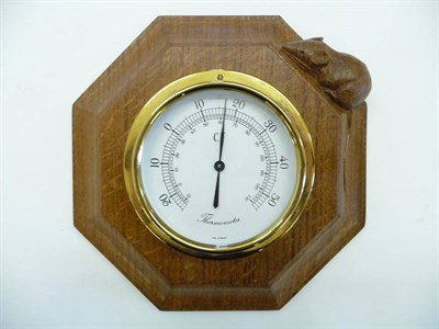 Lot 1831 - A Robert "Mouseman" Thompson Oak Octagonal Thermometer, brass German mechanism, with carved...