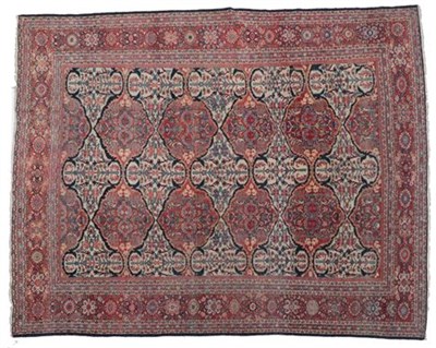Lot 320 - Good Sultanabad Carpet West Iran, circa 1900 The cream field with columns of oval madder medallions
