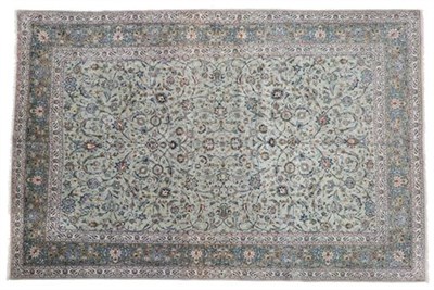 Lot 322 - Kashan Carpet Central Iran, circa 1970 The ice blue field with an allover design of palmettes...