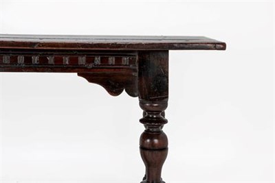 Lot 330 - A Mid 17th Century Joined Oak Refectory Dining Table, of plank top construction with cleated...