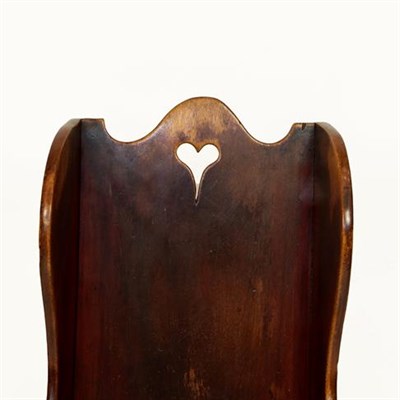 Lot 347 - A Victorian Stained Pine Child's Rocking/Commode Chair, mid 19th century, with heart shaped pierced