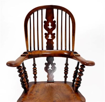 Lot 353 - A Mid 19th Century Ash and Elm High-Back Windsor Armchair, with spindle back support, double...