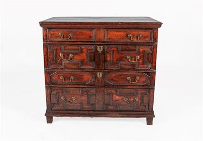 Lot 355 - A Late 17th Century Geometric Moulded Oak Chest, the moulded top above four two-as-one drawers,...