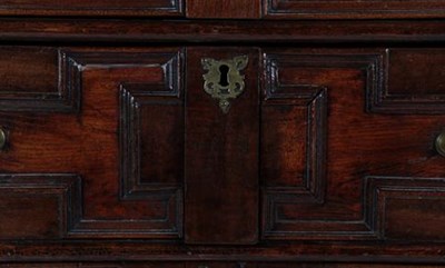 Lot 355 - A Late 17th Century Geometric Moulded Oak Chest, the moulded top above four two-as-one drawers,...