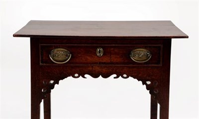 Lot 356 - A George II Oak and Mahogany Crossbanded Side Table, the moulded top above a single frieze...