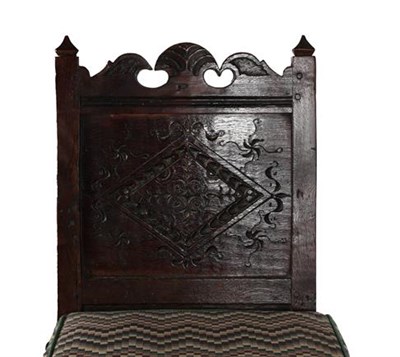 Lot 358 - A Joined Oak Back Stool, circa 1700, the scrolled top rail above a lozenge carved back panel...
