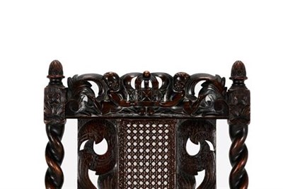 Lot 366 - A Set of Six Victorian Carved Oak and Caned Carolean Style Chairs, late 19th century, including two