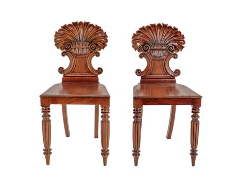Lot 375 - A Pair of Early 19th Century Shell Carved Mahogany Hall Chairs, in the manner of Gillows, with...