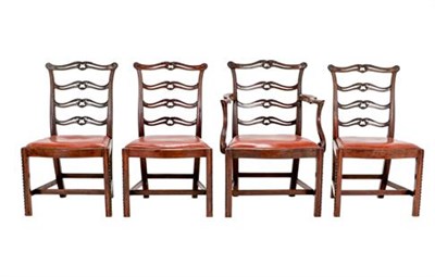Lot 386 - A Set of Four (3+1) George III Carved Mahogany Dining Chairs, circa 1780, recovered with brown...