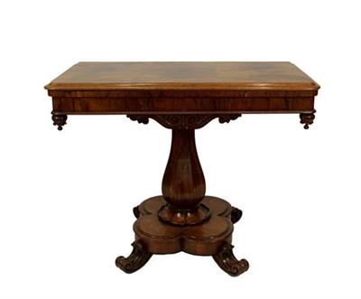 Lot 389 - A Victorian Rosewood Foldover Tea Table, mid 19th century, the moulded frieze above a scrolled...