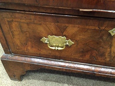 Lot 393 - A George I Walnut, Crossbanded and Feather-Banded Bureau, early 18th century, the fall...