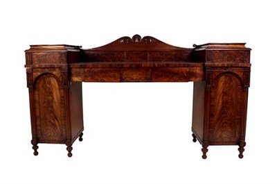 Lot 398 - A George IV Mahogany Bowfront Pedestal Sideboard, 2nd quarter 19th century, the anthemion...