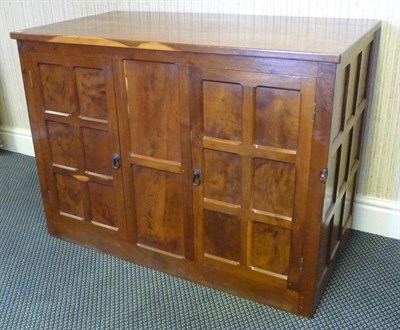 Lot 1840 - A Robert "Mouseman" Thompson Yew Central Counter/Console, the four plank rectangular top above...